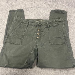Olive button fly skinny jeans